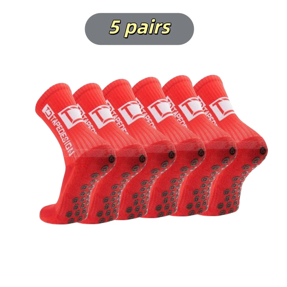 Five pairs of red mid-calf football socks are displayed in a row.