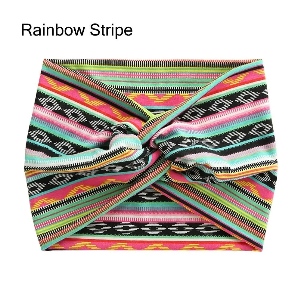 Rainbow stripe fabric headband featuring multicolored stripes in pink, green, black, and white.