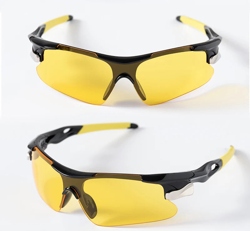 A pair of yellow-tinted sport sunglasses with black frames shown in a studio setting.