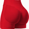 A close-up view of a red high-waisted knit fitness short garment.