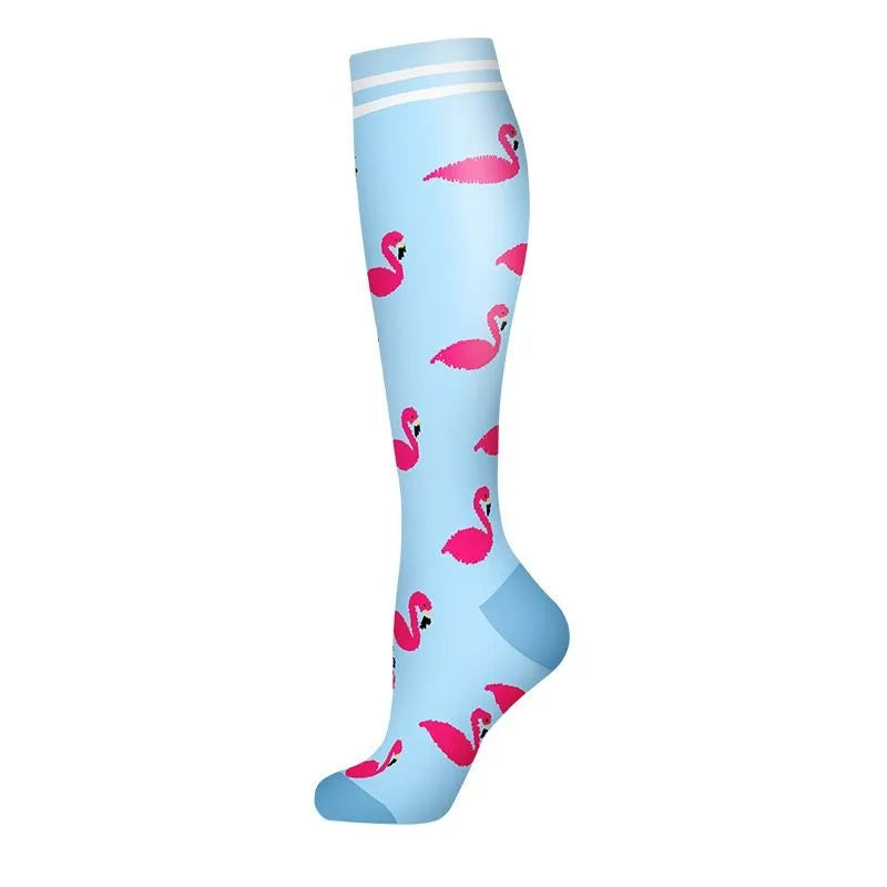 Light blue compression socks featuring a pattern of pink flamingos.
