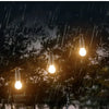A series of images showing a simple retro solar-powered LED camping lantern in various outdoor and indoor settings.