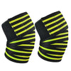 Pair of black and neon yellow knee wraps for strength training