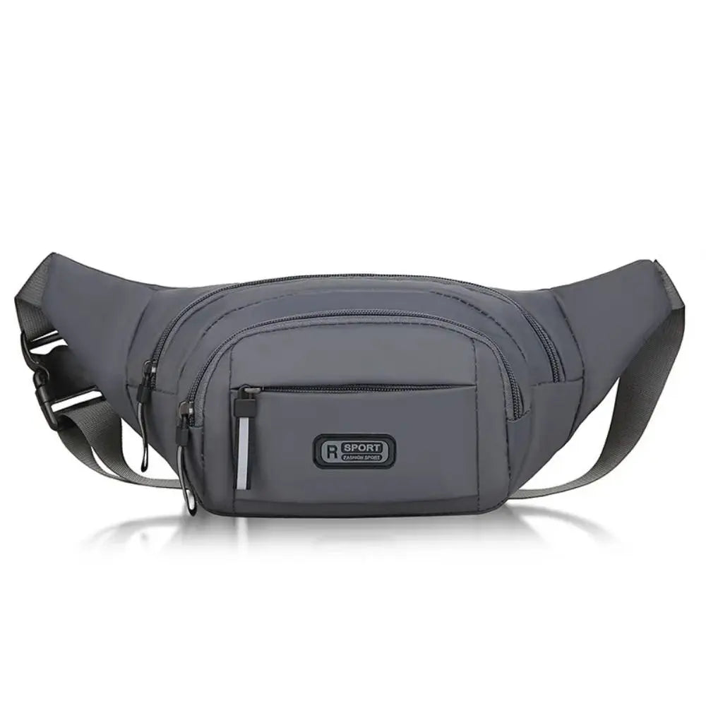 A dark gray durable nylon waist bag for men with a flap closure and shoulder straps.