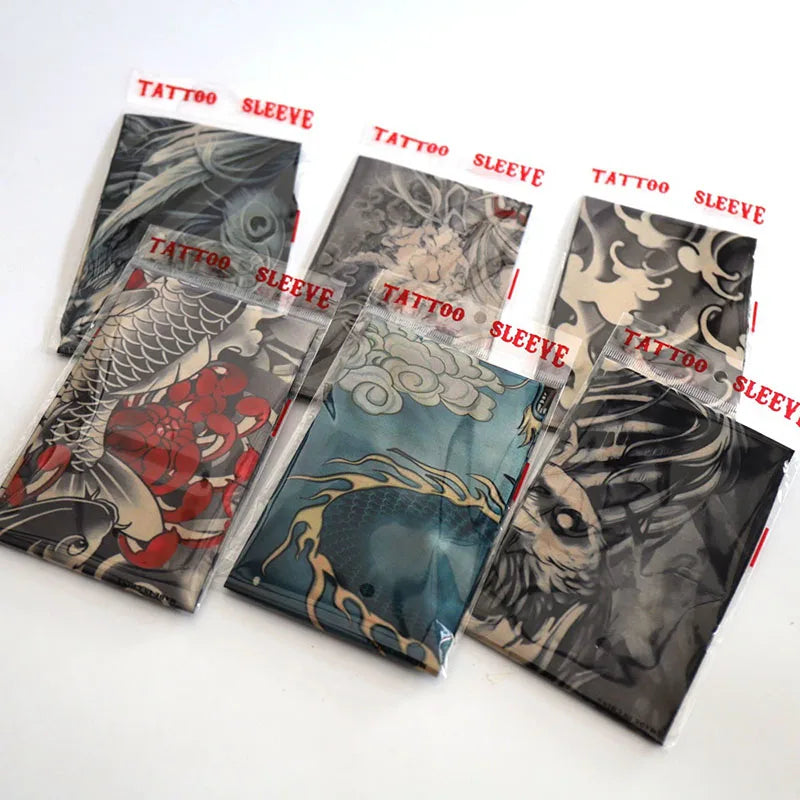 Ocho mangas elásticas transpirables con diseños intrincados estilo tatuaje para protección solar y contra el frío.