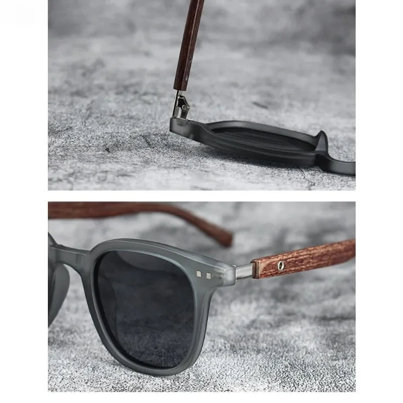 A close-up of brown wood grain polarized sunglasses resting on a gray textured surface.