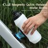 A hand is holding an OsmaR Magnetic Quick-Release water bottle, demonstrating its magnetic locking mechanism.