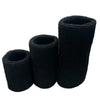 A set of three black dual sports wristbands for sweat absorption.