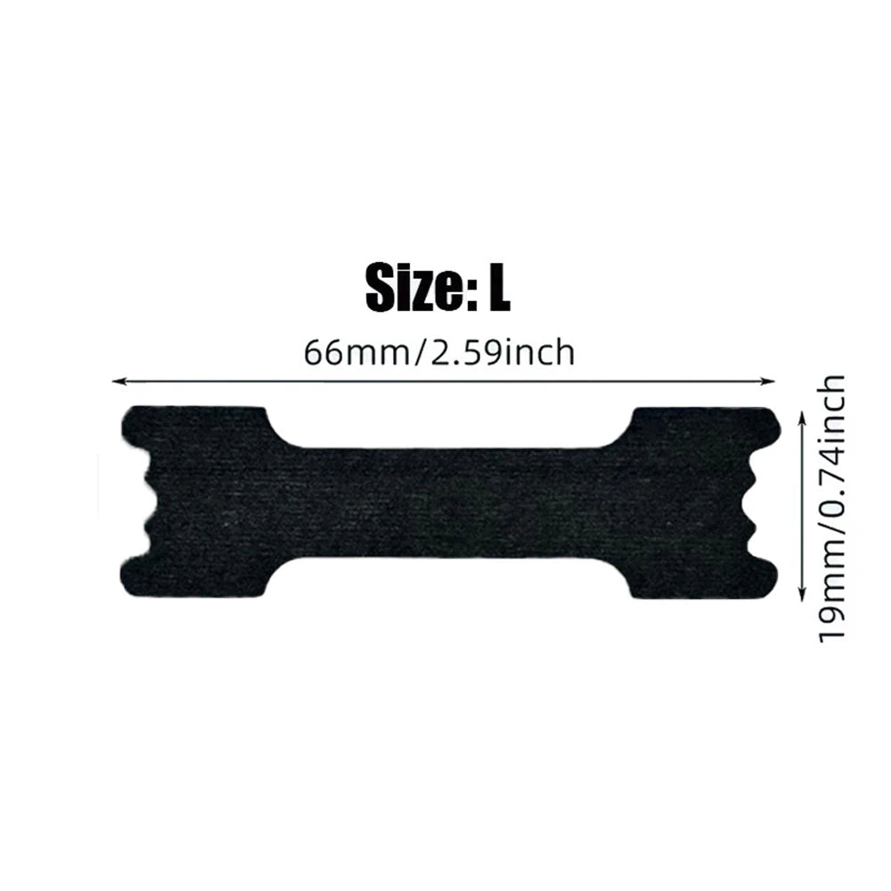 Black anti-snoring nasal strip, size L, measuring 66mm or 2.59 inches.