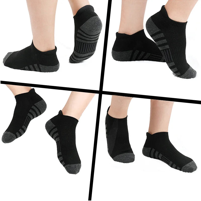 A collection of black athletic running socks for men and women shown from various angles.