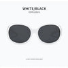White and black sunglasses with diamond inlay detailing.