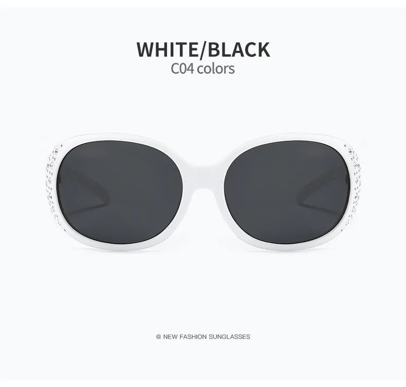 White and black sunglasses with diamond inlay detailing.