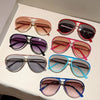 A collection of vintage pilot gradient sunglasses in various colors including rose gold, silver, purple, and blue.