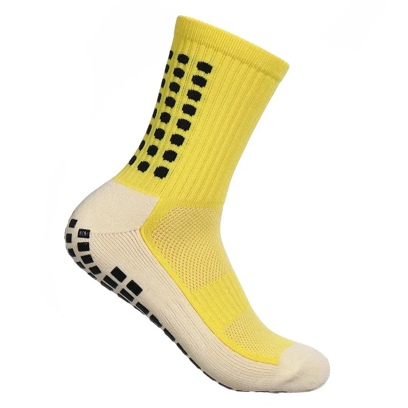 Calcetines deportivos amarillos para hombre con puntos negros y dobladillo beige
