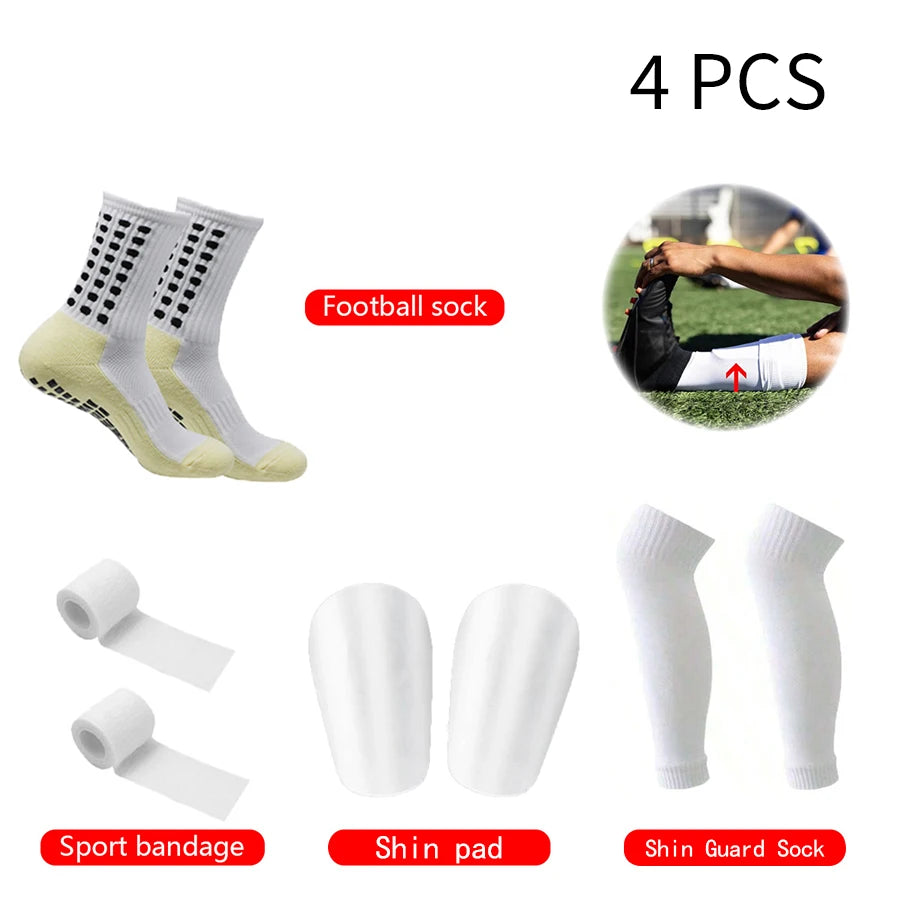 Four pairs of white football socks, sport bandages, shin pads, and shin guard socks.