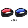 A pair of black tennis elbow support braces, one red and one blue, shown against a white background.