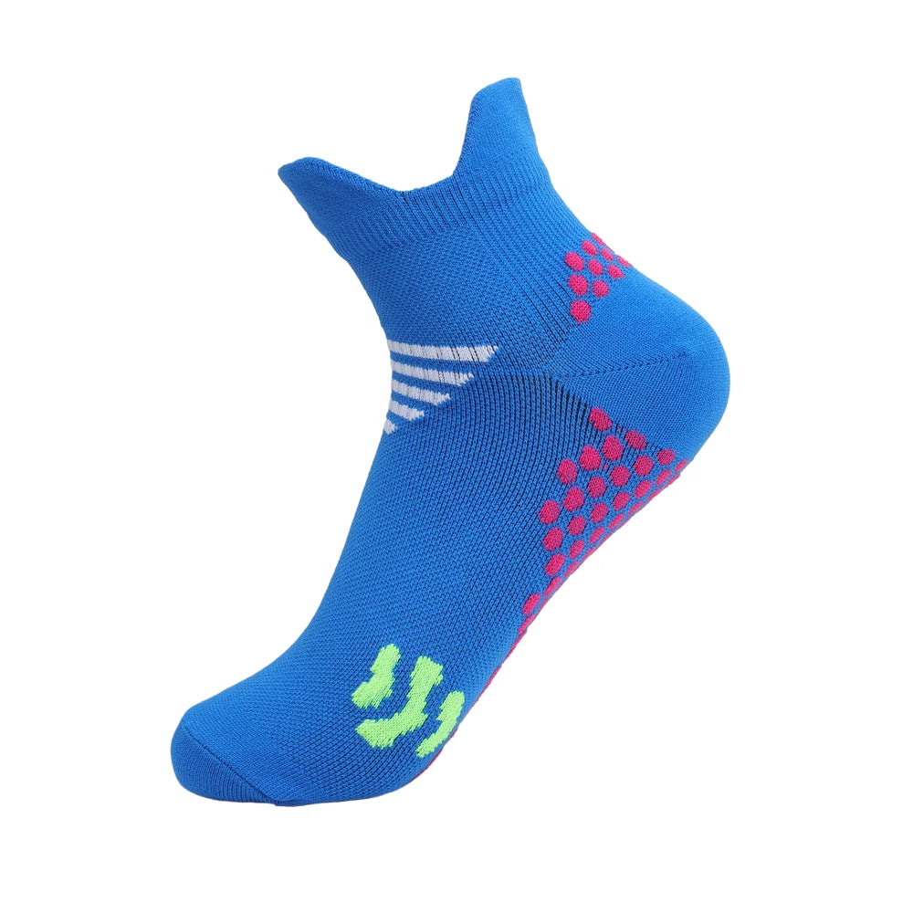 Blue compression running socks with white stripes and red dots