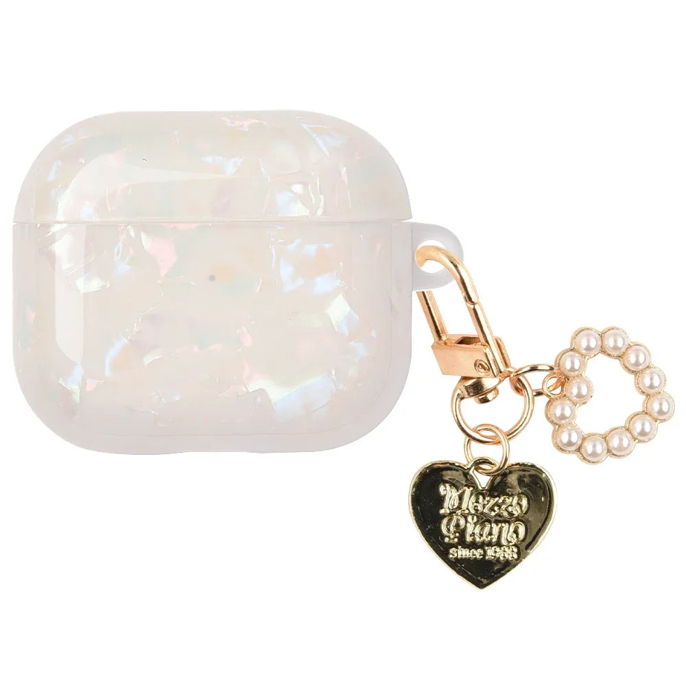 A clear, iridescent white protective case for AirPods Pro attached to a gold chain with a heart pendant.