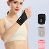 A woman demonstrates an adjustable wrist support brace in black, gray, and pink colors.