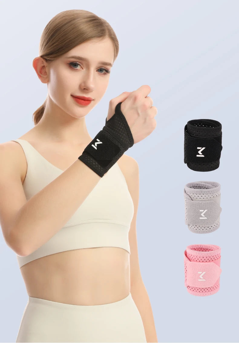 A woman demonstrates an adjustable wrist support brace in black, gray, and pink colors.