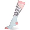 A close-up of a pair of light blue compression socks with pink accents and black stripes.