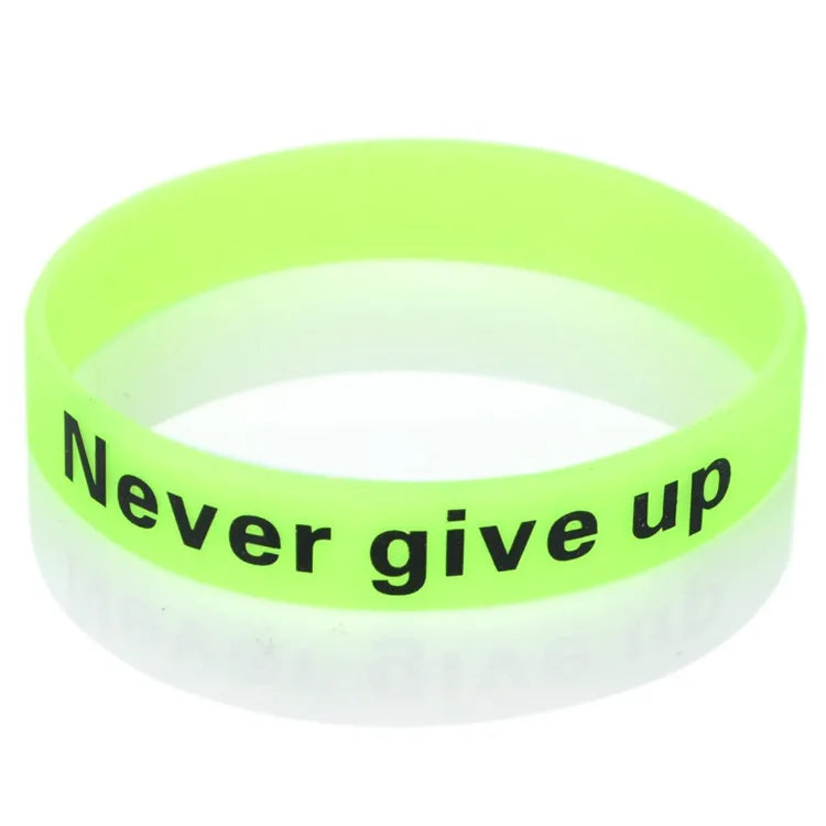 Bracelet silicone vert lime vif avec le texte Ne renonce jamais.