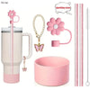 A set of six reusable accessories for a tumbler includes a pink tumbler, a sparkling straw, a flower charm, and a pink cup.