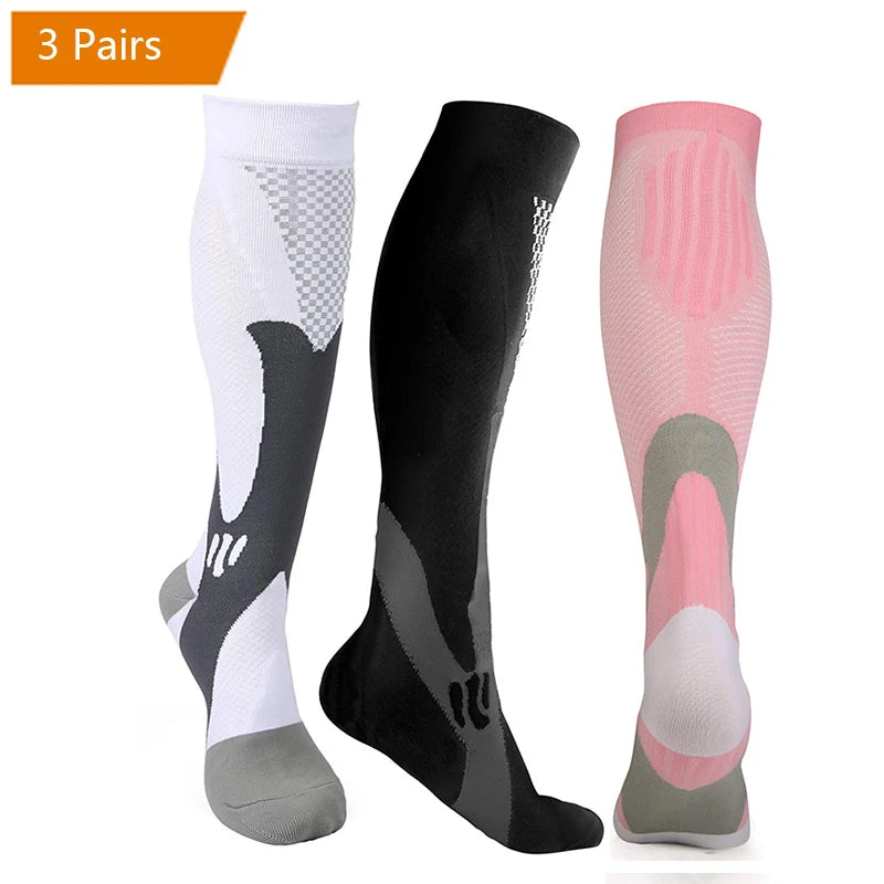 Three pairs of compression socks for men in black, white, and pink colors shown vertically.