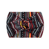 A close-up of a boho printed wide knitted headband featuring black, red, and yellow geometric patterns.