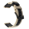 A beige nylon quick release watch band with black accents shown in a curved shape.