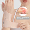 A hand wearing a light pink ultra-thin spandex wrist guard for joint support, demonstrating its protective fit.