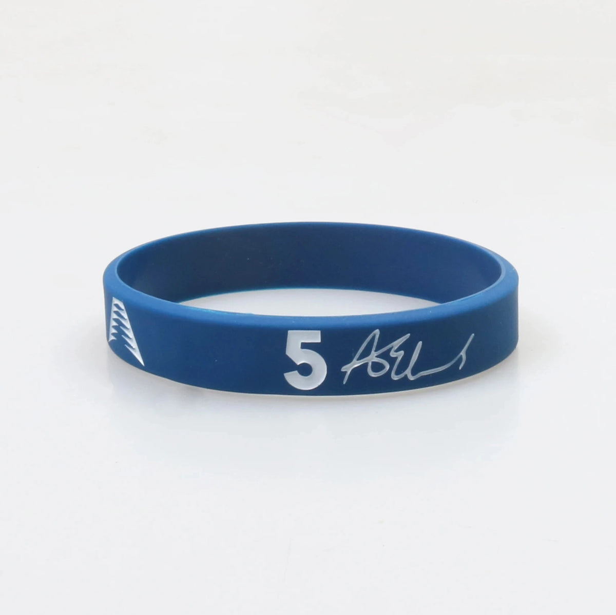A blue silicone wristband with the number 5 and a signature on the front.