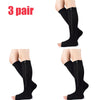 Three pairs of black compression zippered stockings shown on legs.