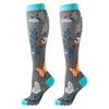 Pair of knee-high butterfly compression socks in gray with blue accents and floral patterns