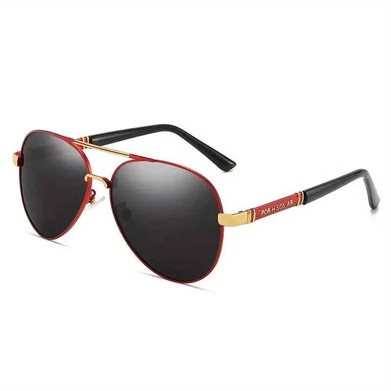 A pair of black sunglasses with a red accent detail and a black frame.