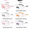 A collection of transparent safety goggles in various colors including purple, pink, gray, black, orange, and cyan.