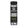 A glass bottle of Walker Tape Ultra Hold hair system adhesive for lace wig glue.
