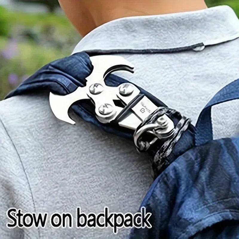Stainless steel folding grappling hook attached to a backpack strap