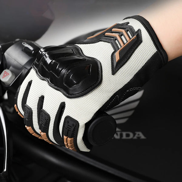 A close-up of durable motorcycle riding gloves with black and beige accents being worn on a hand.
