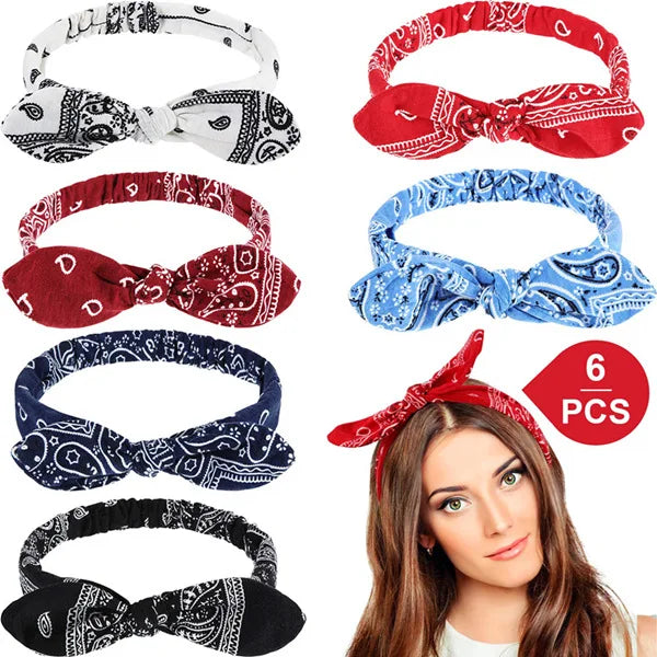 A collection of paisley print boho headbands in red, blue, and black fabric.
