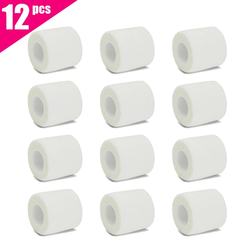 Twelve rolls of white medical grade elastic bandage for fingers and wrists