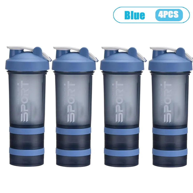 Four blue sports shaker bottles with handles and lids are displayed side by side.