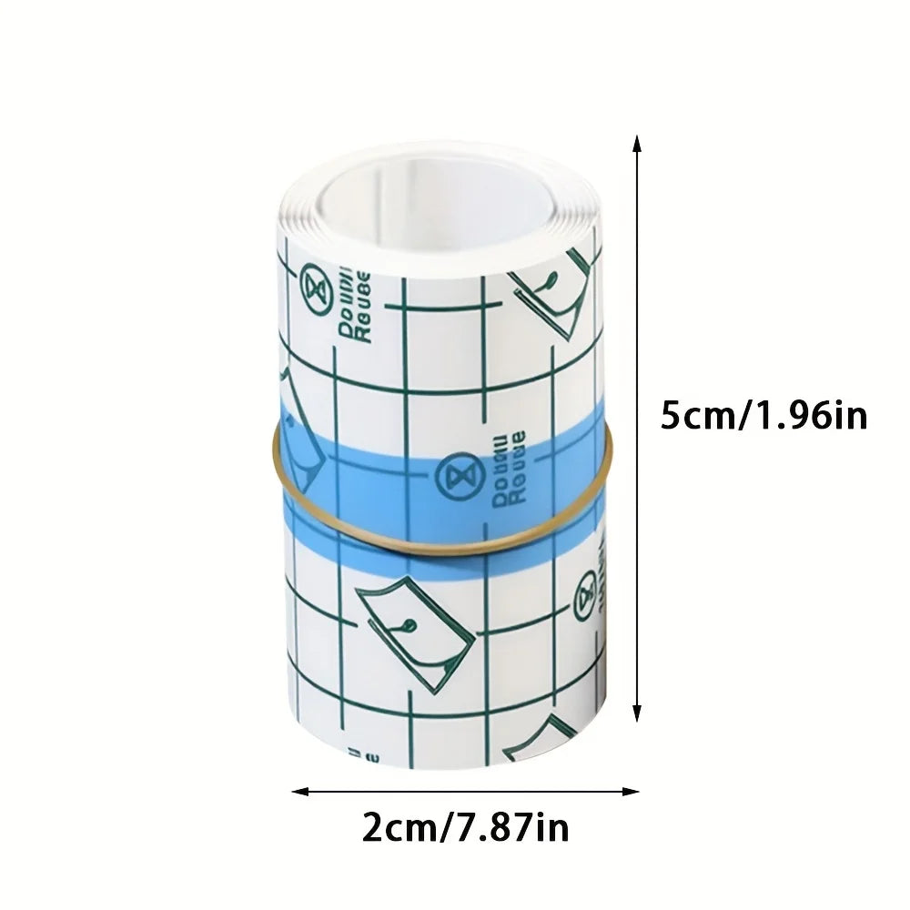 Roll of transparent self-adhesive tape with grid markings for finger protection