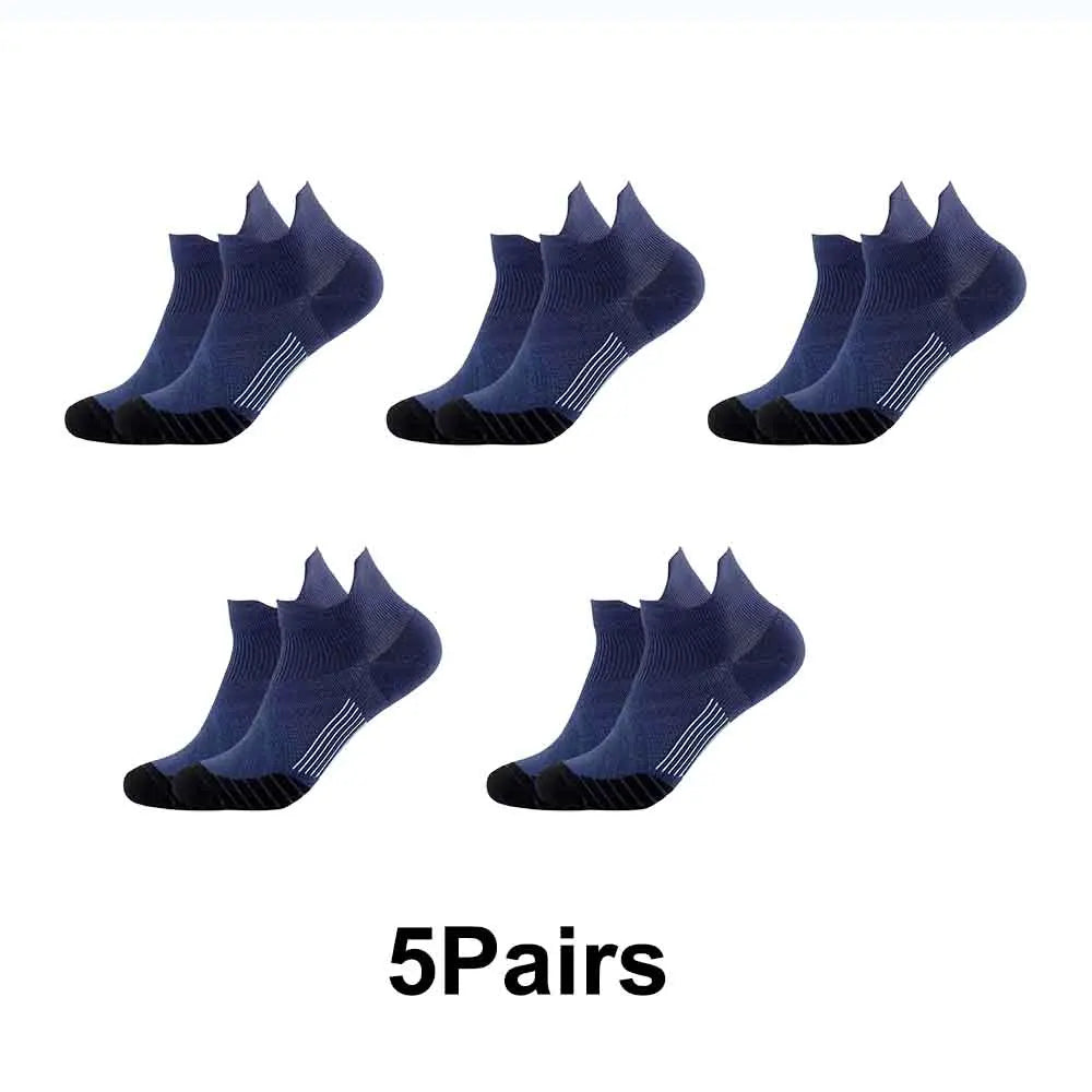 Five pairs of navy blue performance compression sports socks displayed in a row.