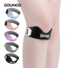 Various colored silicone knee support straps shown on a leg, demonstrating different shades of gray, pink, and black.