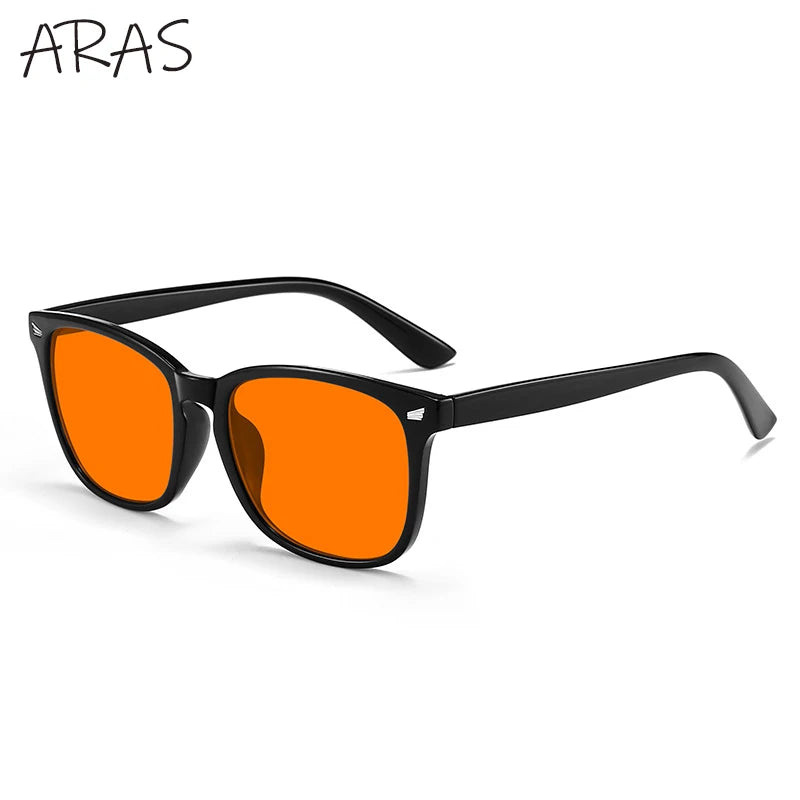 A pair of orange-tinted glasses with black frames shown against a white background.