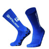 A pair of royal blue football socks with a textured pattern and silicone grip