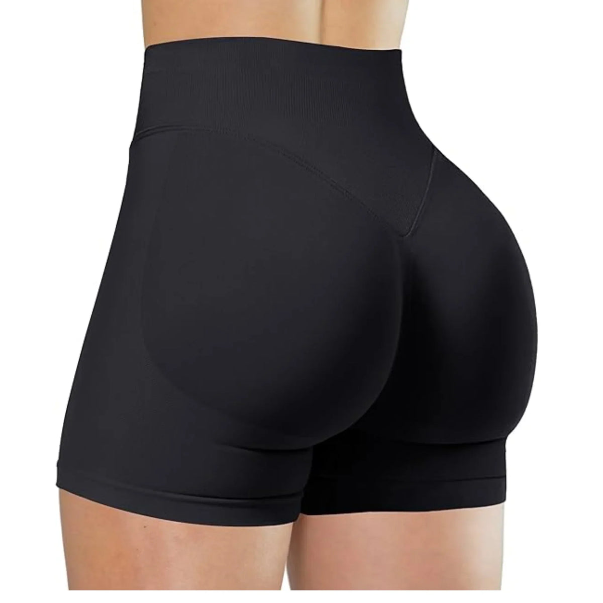 Black high-waisted yoga shorts worn by a person from the rear view.