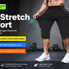 A muscular man models black Ultra Stretch Comfort gym shorts, highlighting their fit and fabric features.