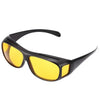 A pair of black night vision driving sunglasses with bright yellow lenses.